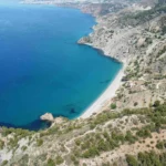 Aerial view of Cala del Cañuelo Nude Beach - looking south