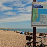 Plenty of signage to let you know you're in the right area at Eastney Naturist Beach