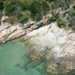 Small sandy beach in the nude section at Paradise Beach Thasos
